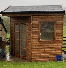 Garden shed with corner doors