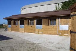 Stabling With Brown Shingle Roof